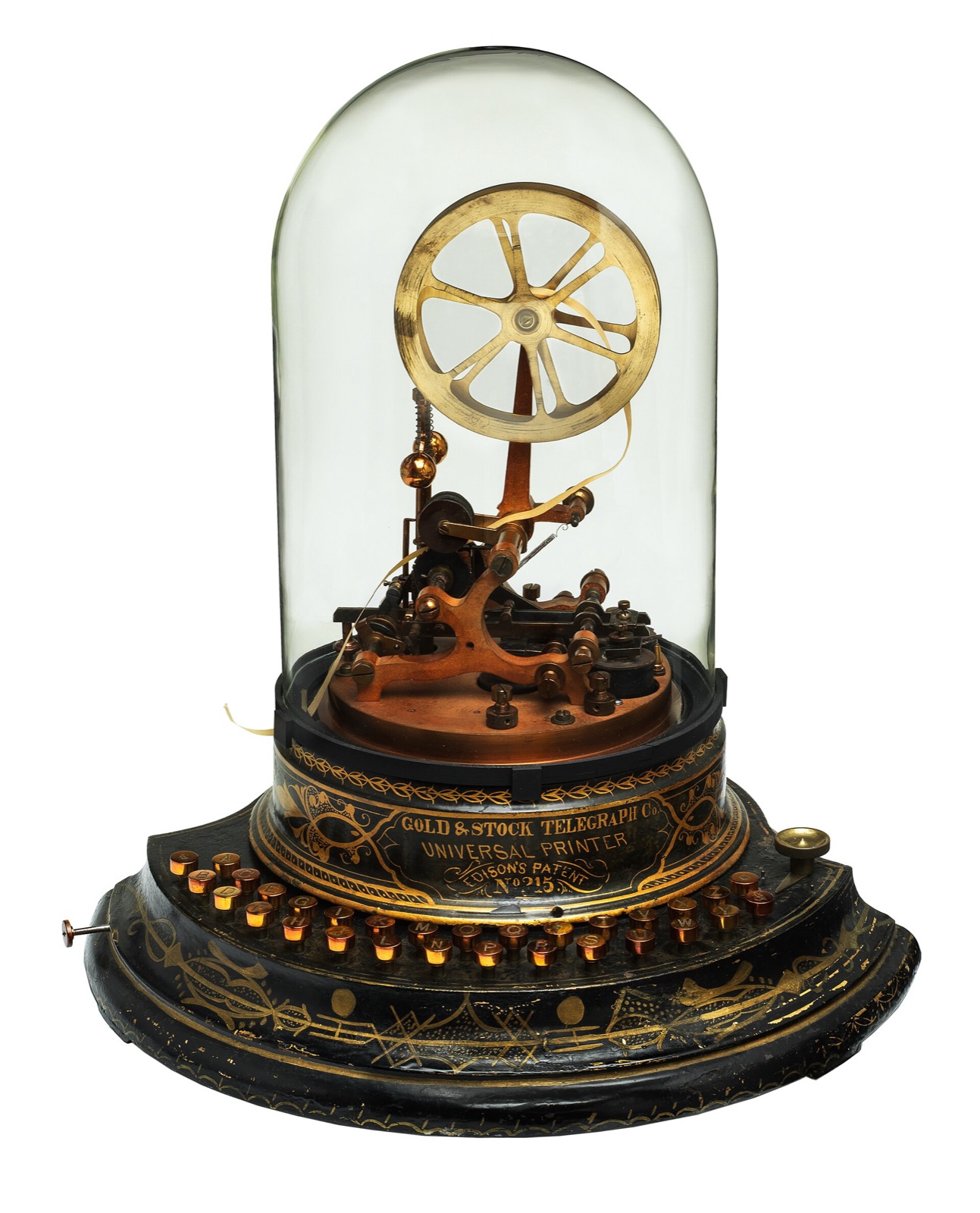 Edison's Universal stock ticker printer under a glass dome